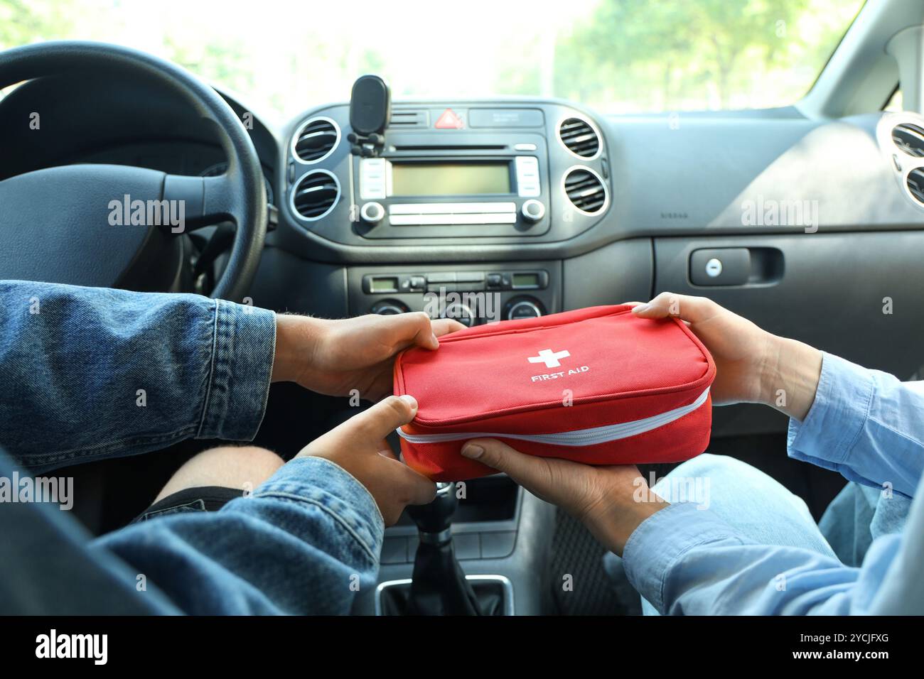 Woman passing first aid hi-res stock photography and images - Alamy