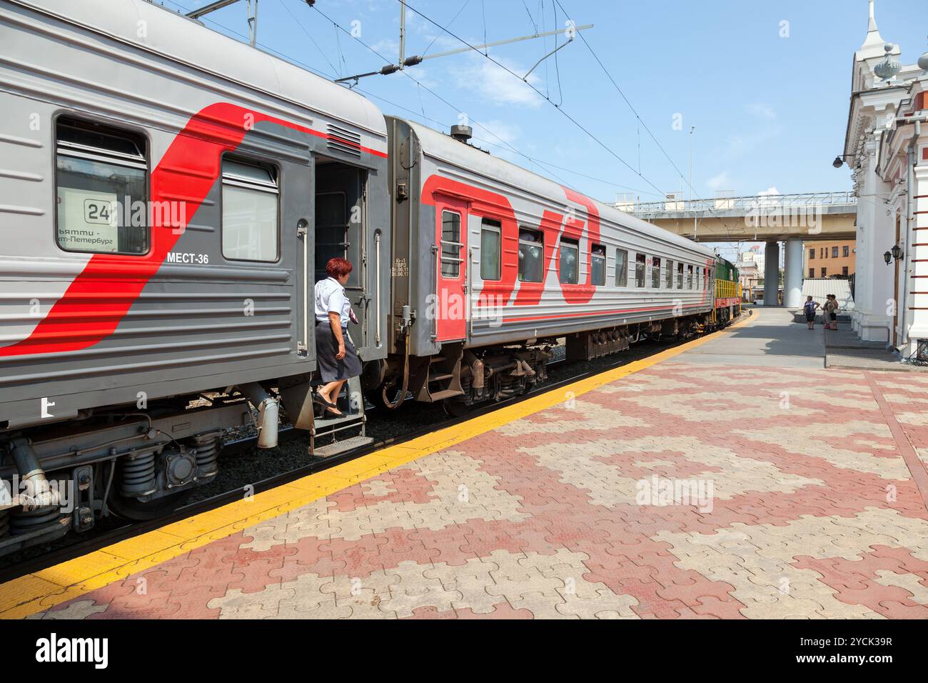 NIZHNY NOVGOROD, RUSSIA - JUNE 29, 2013: Platforms in Moskovsky Rail Terminal in summertime. Trains of the Russian Railways company (RZhD) Stock Photo