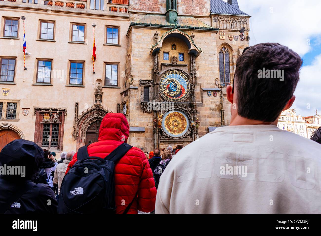 People waiting in front of the astronomical clock waiting for the time and the procession of the apostles. Old Town Square, Prague, Czech Republic, Eu Stock Photo