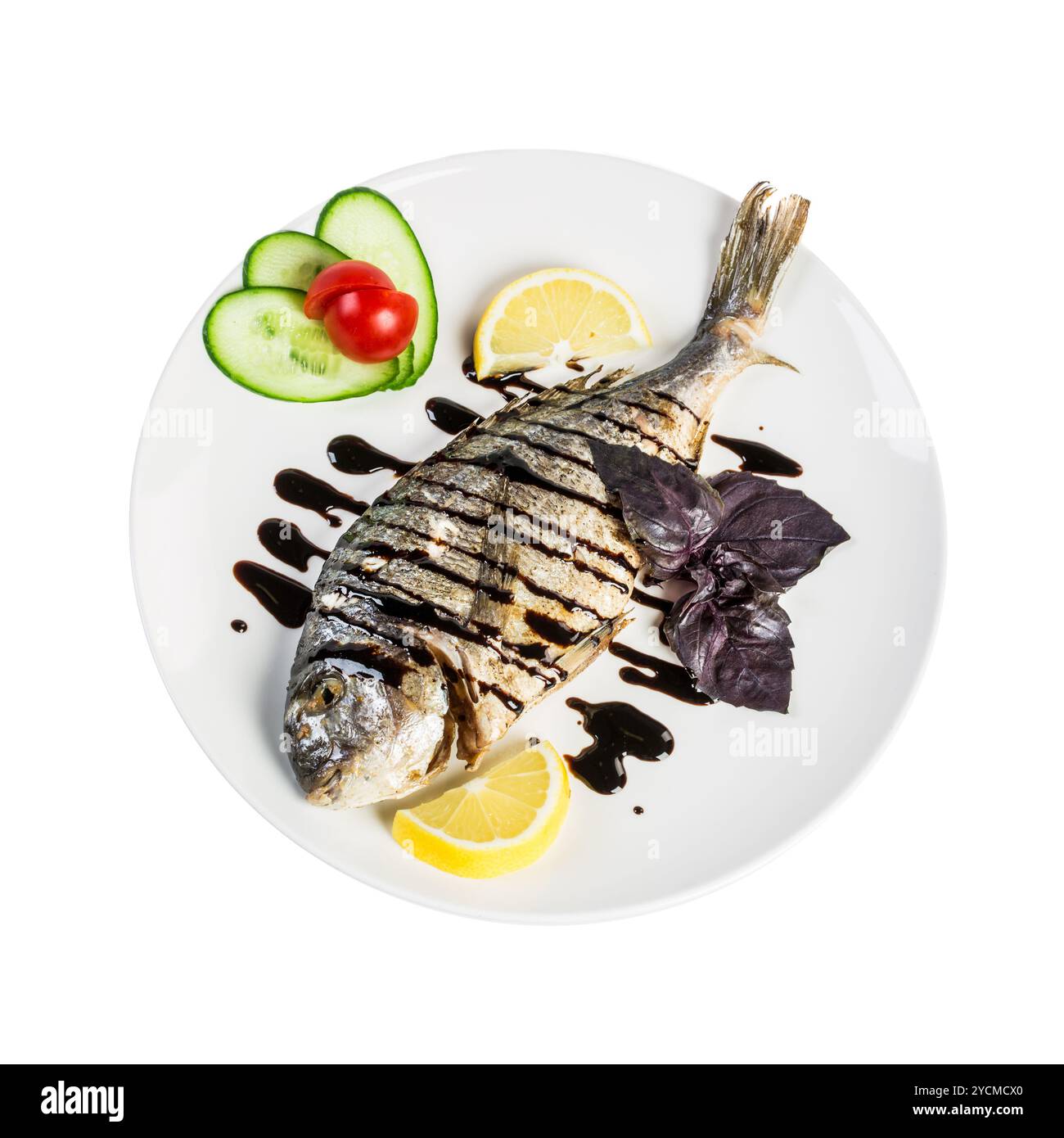 Dorado roast fish on the white Stock Photo - Alamy