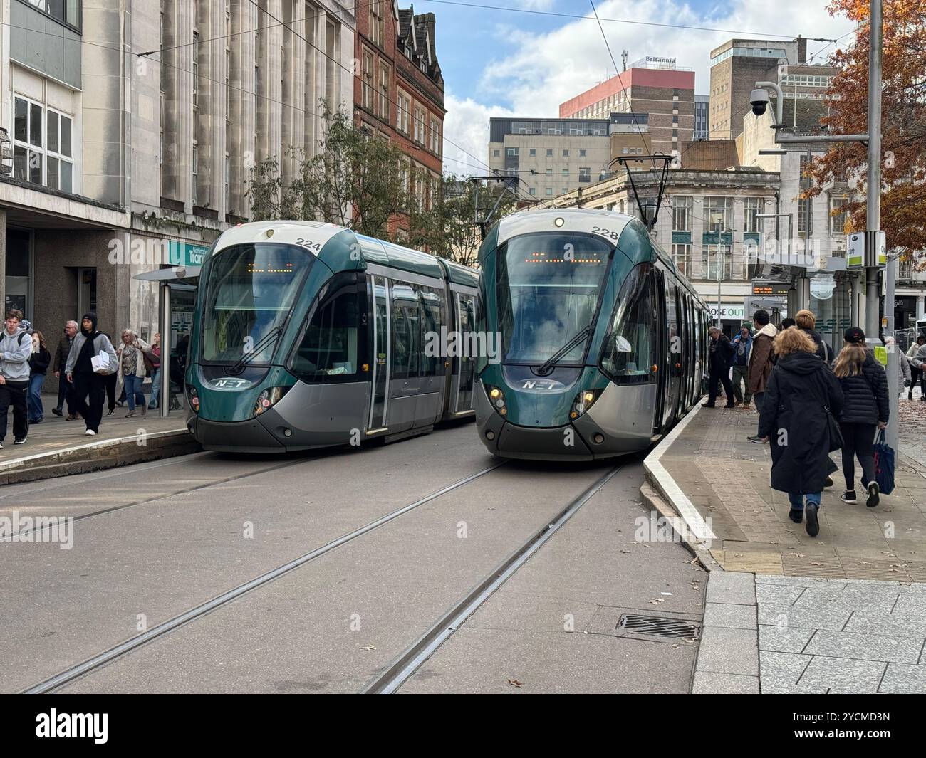 Nottingham Express Transit Citadis 302 Trams at the Old Market Square tram stop on South Parade Nottingham City Centre UK October 2024 - Smartphone Captured Stock Image