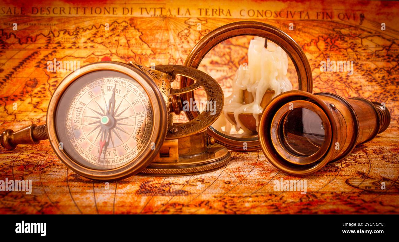 Vintage magnifying glass lies on an ancient world map Stock Photo - Alamy