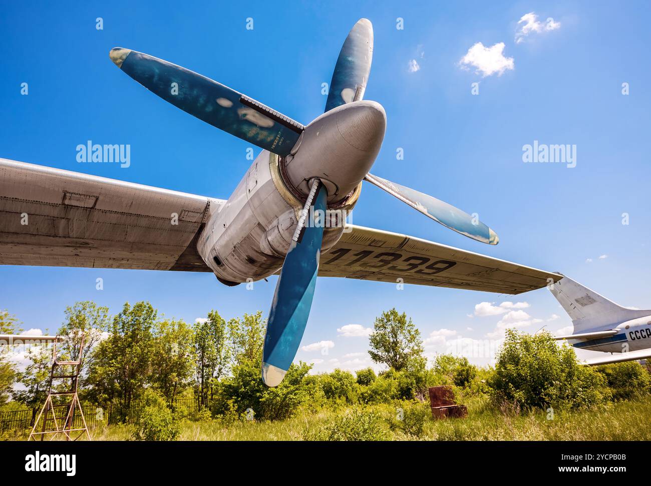 Turbines of turboprop aircraft An-12 at an abandoned aerodrome Stock ...