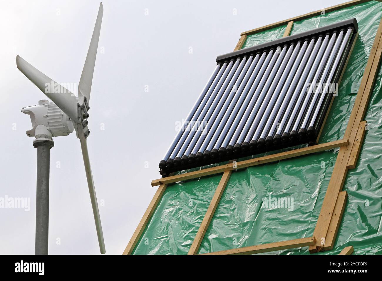 Solar water heater at roof of new house Stock Photo - Alamy