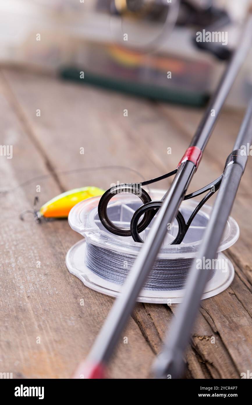 Guide rings on graphite rods and watted cord Stock Photo