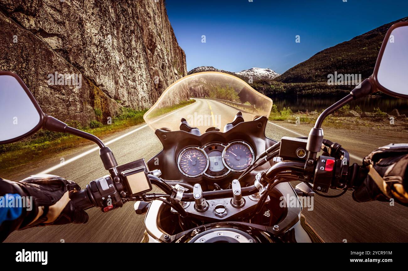 Biker First-person view, mountain serpentine. Stock Photo
