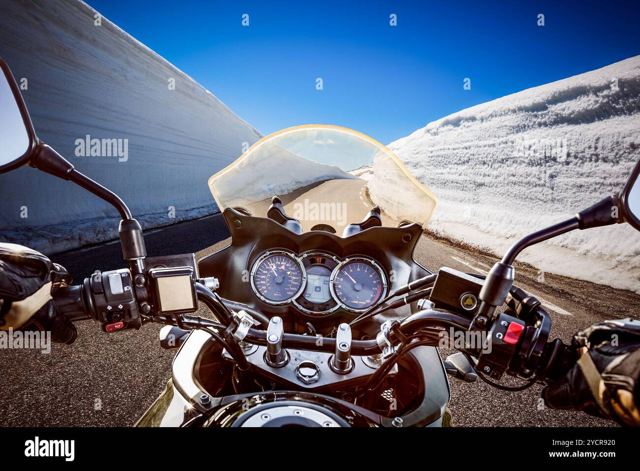 Biker First-person view, mountain serpentine. Stock Photo
