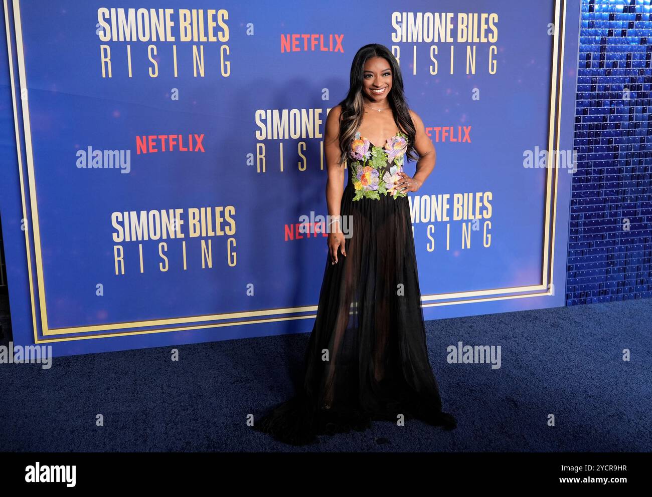 Simone Biles poses at the premiere of the Netflix documentary series