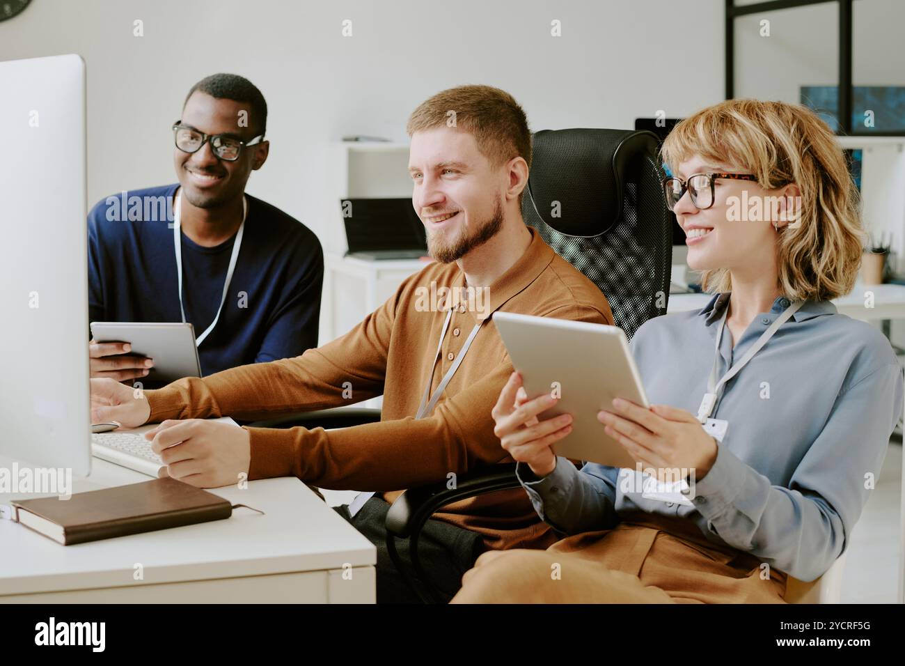 Group of Developers Working In Office Stock Photo