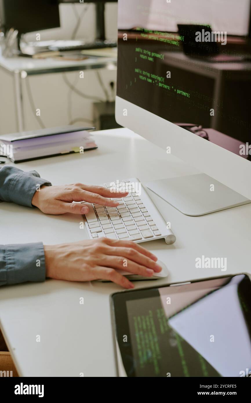Hands Of Unrecognizable Female Programmer Stock Photo