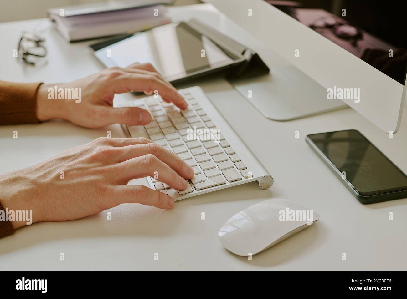 Unrecognizable Male Hands Typing On Computer Keyboard Stock Photo