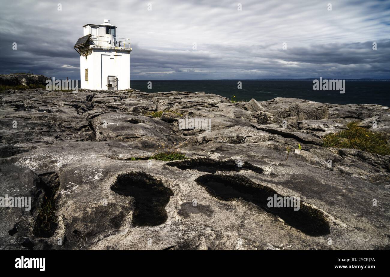 A view of the Black Head Lighthouse on the Burren Coast of County Clare Stock Photo