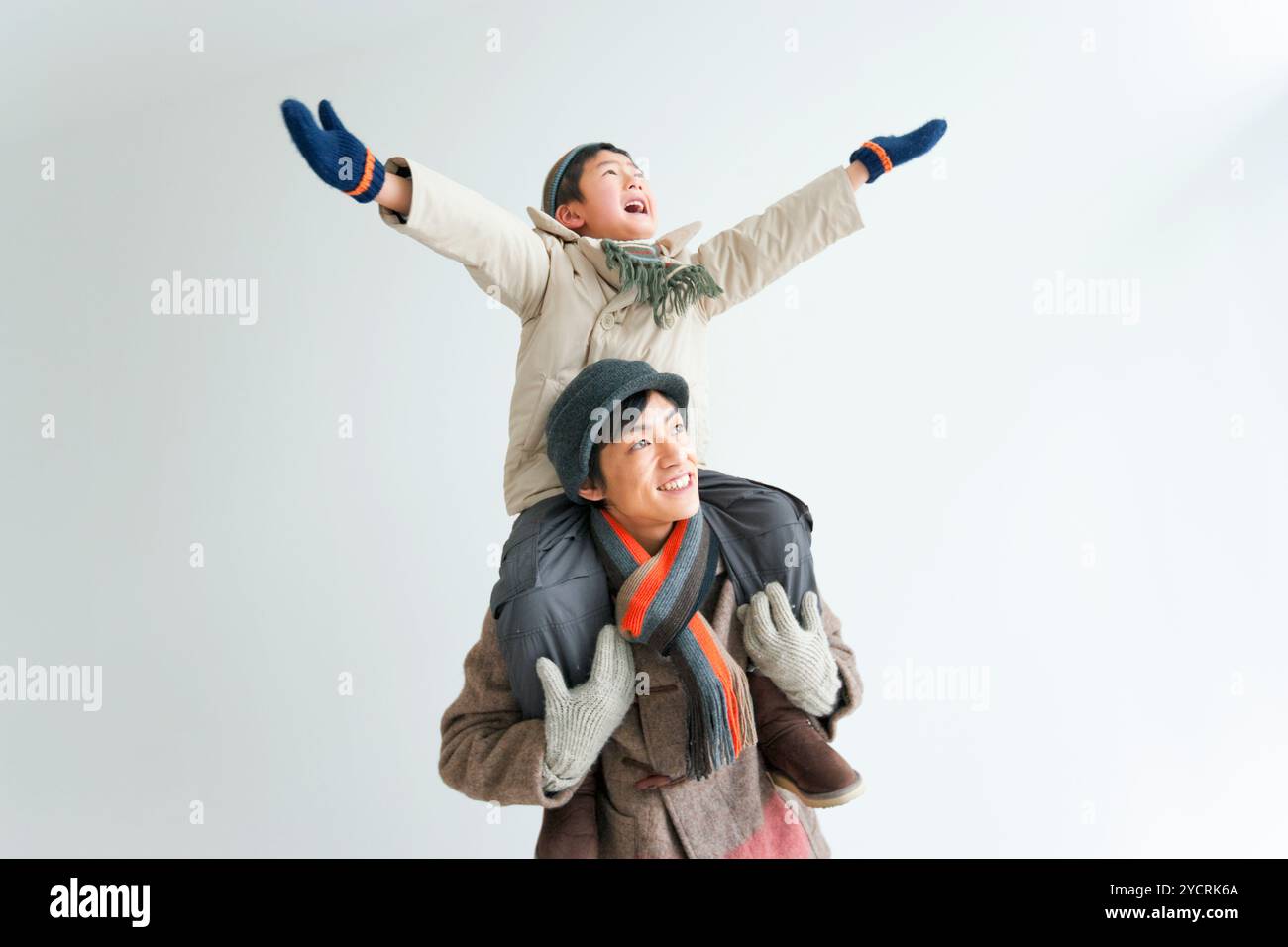 Father carrying his son on his shoulders Stock Photo - Alamy