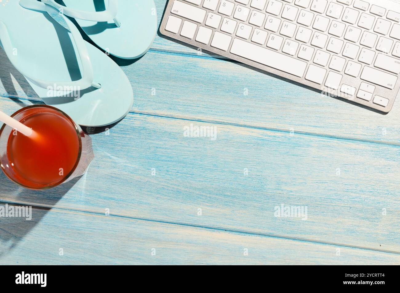 Keyboard on beach table Stock Photo - Alamy