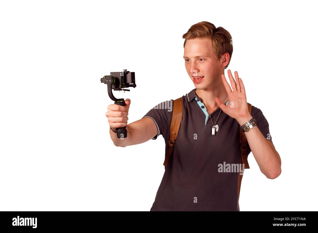 Videographer holds mobile camera on gimbal. Stock Photo