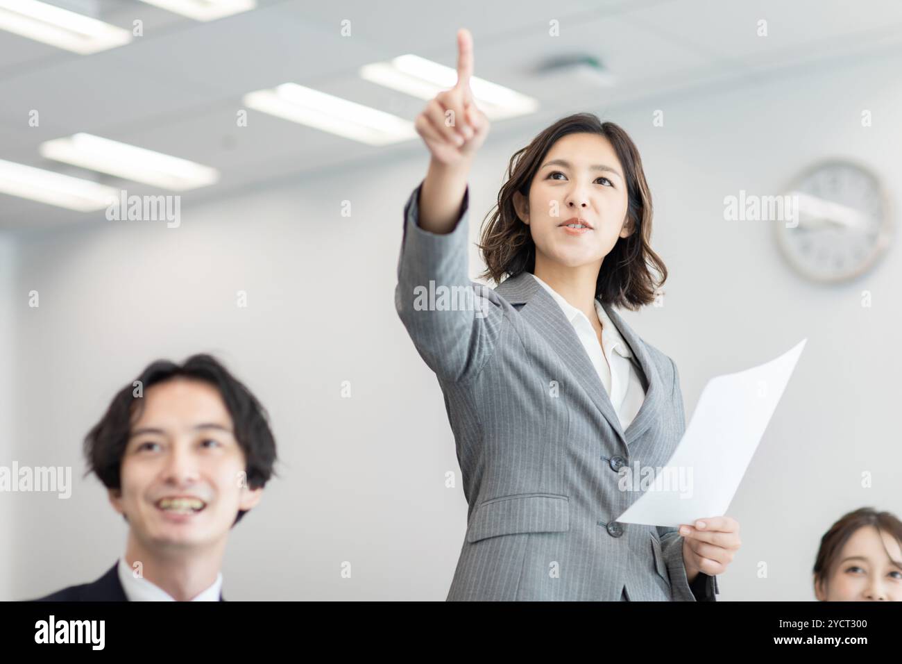 Business team giving presentation in conference room Stock Photo