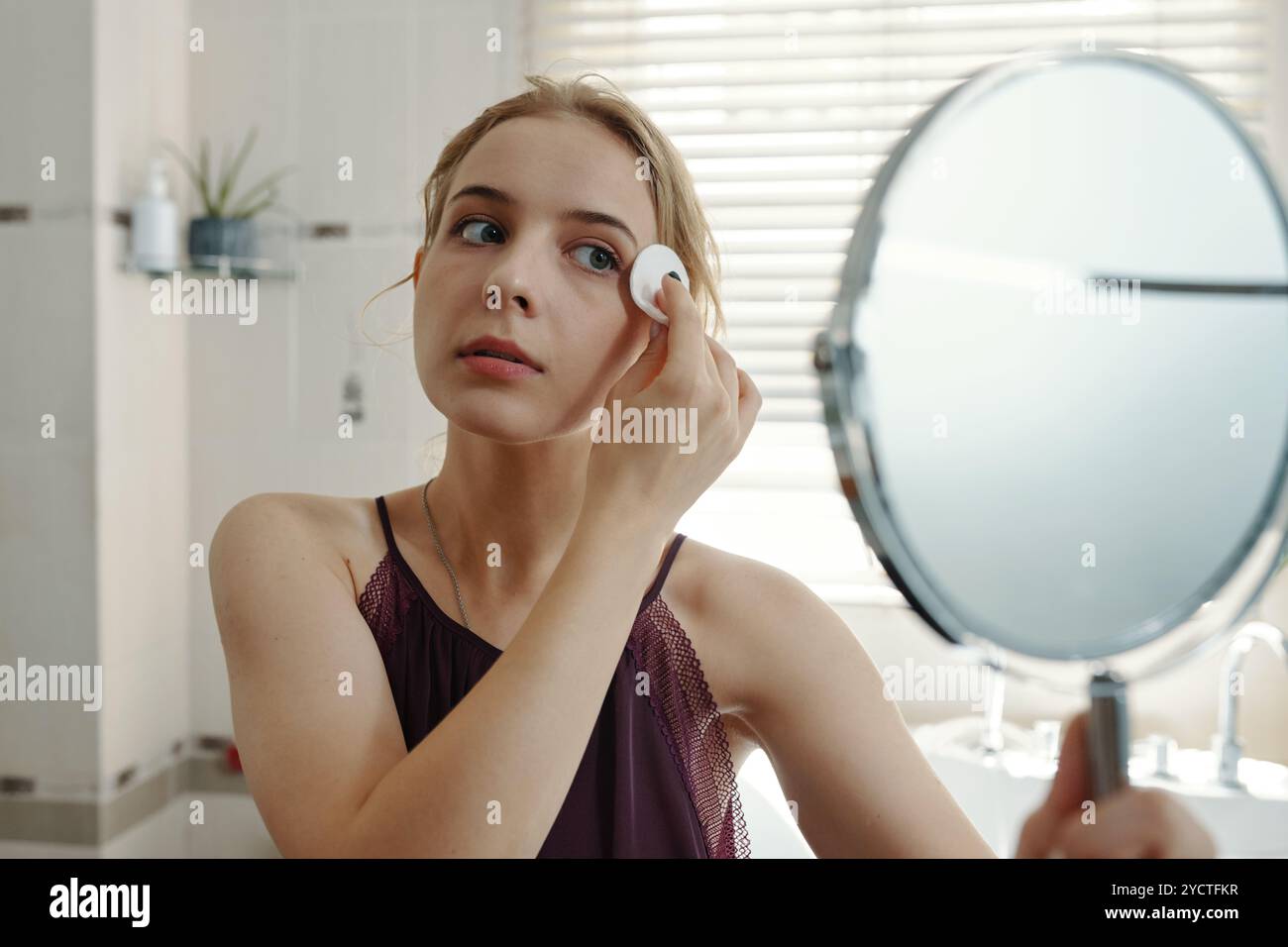 Woman cleansing face hi-res stock photography and images - Alamy