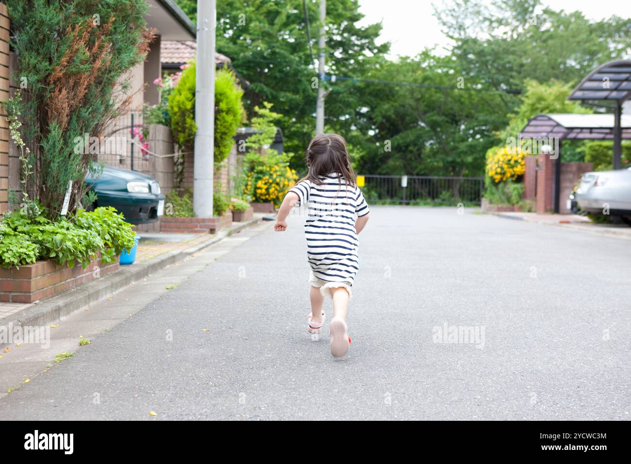 Kindergarten girl running hi-res stock photography and images - Alamy