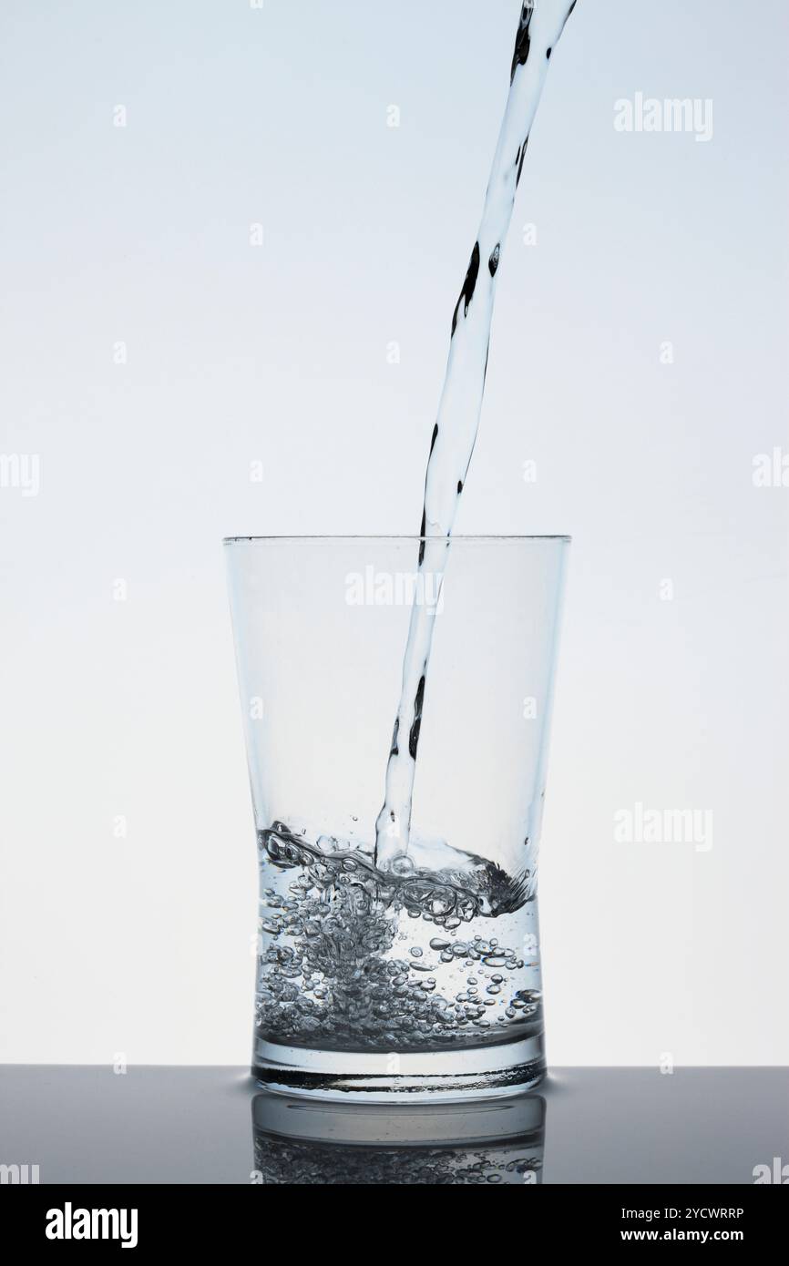 Drinking water pour glass hi-res stock photography and images - Alamy