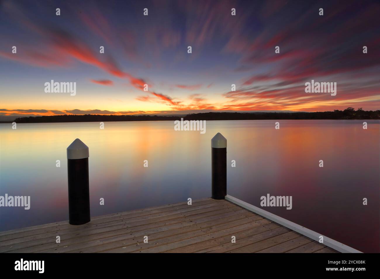 Serene sunset at Kikatinalong jetty Australia Stock Photo