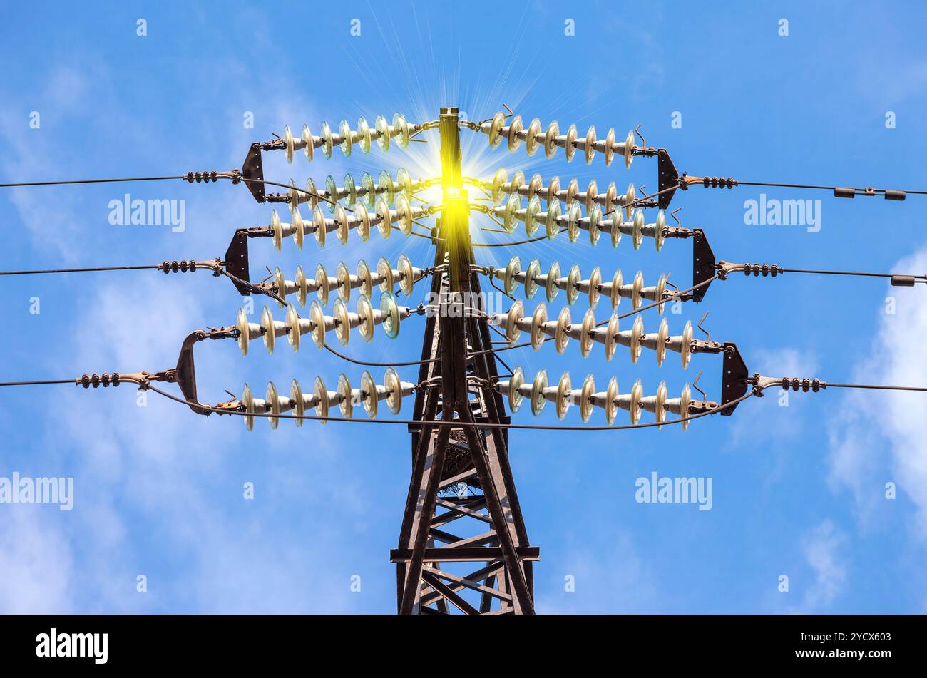 High voltage electric tower against the blue sky. Power transmission ...
