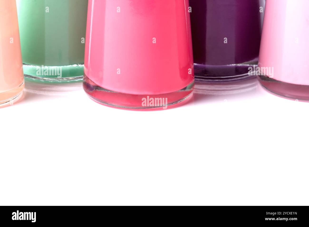 Bottles with spilled nail polish Stock Photo