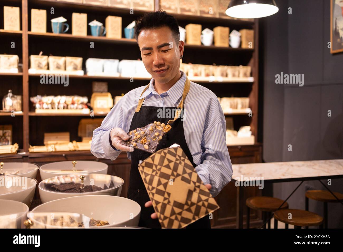 Asian shop worker hi-res stock photography and images - Alamy