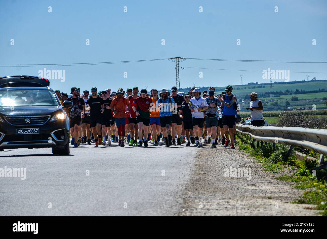 Bizerte, Tunisia. 07 April 2024. Russ Cook runs with his supporters ...