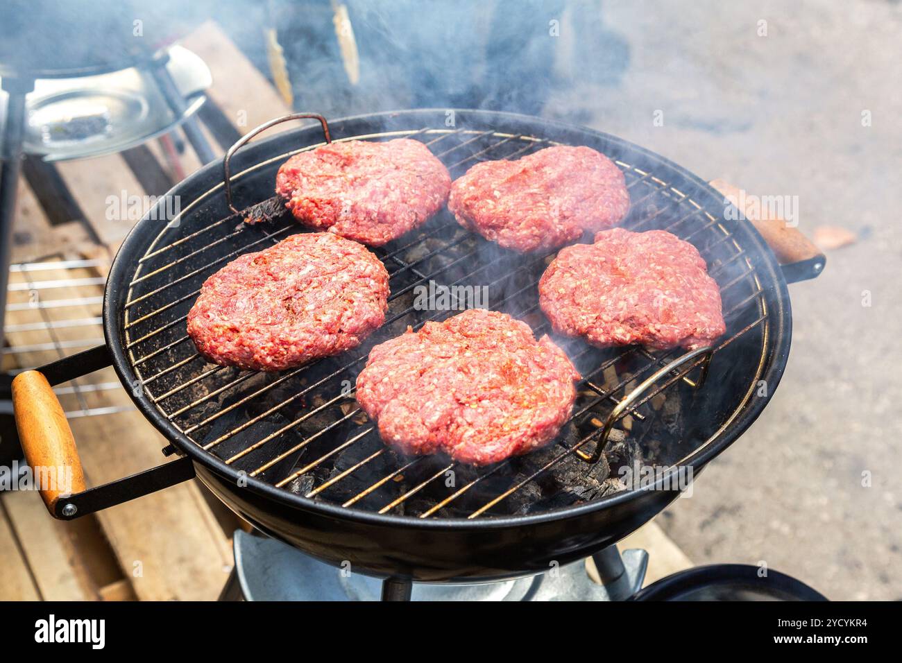 Barbecue with delicious grilled meat on the hot coals of grill Stock ...