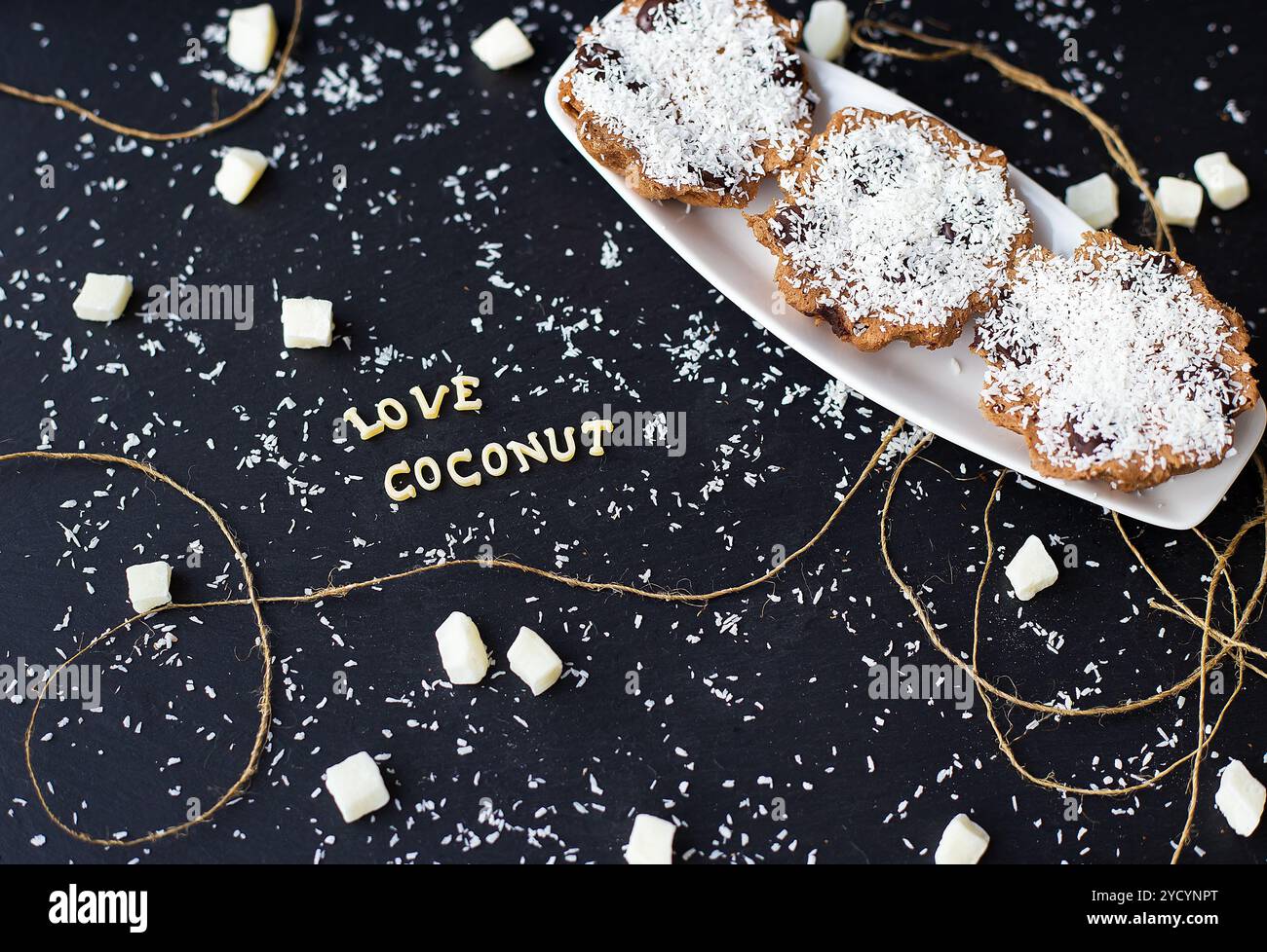 Coconut muffins on a black background Stock Photo
