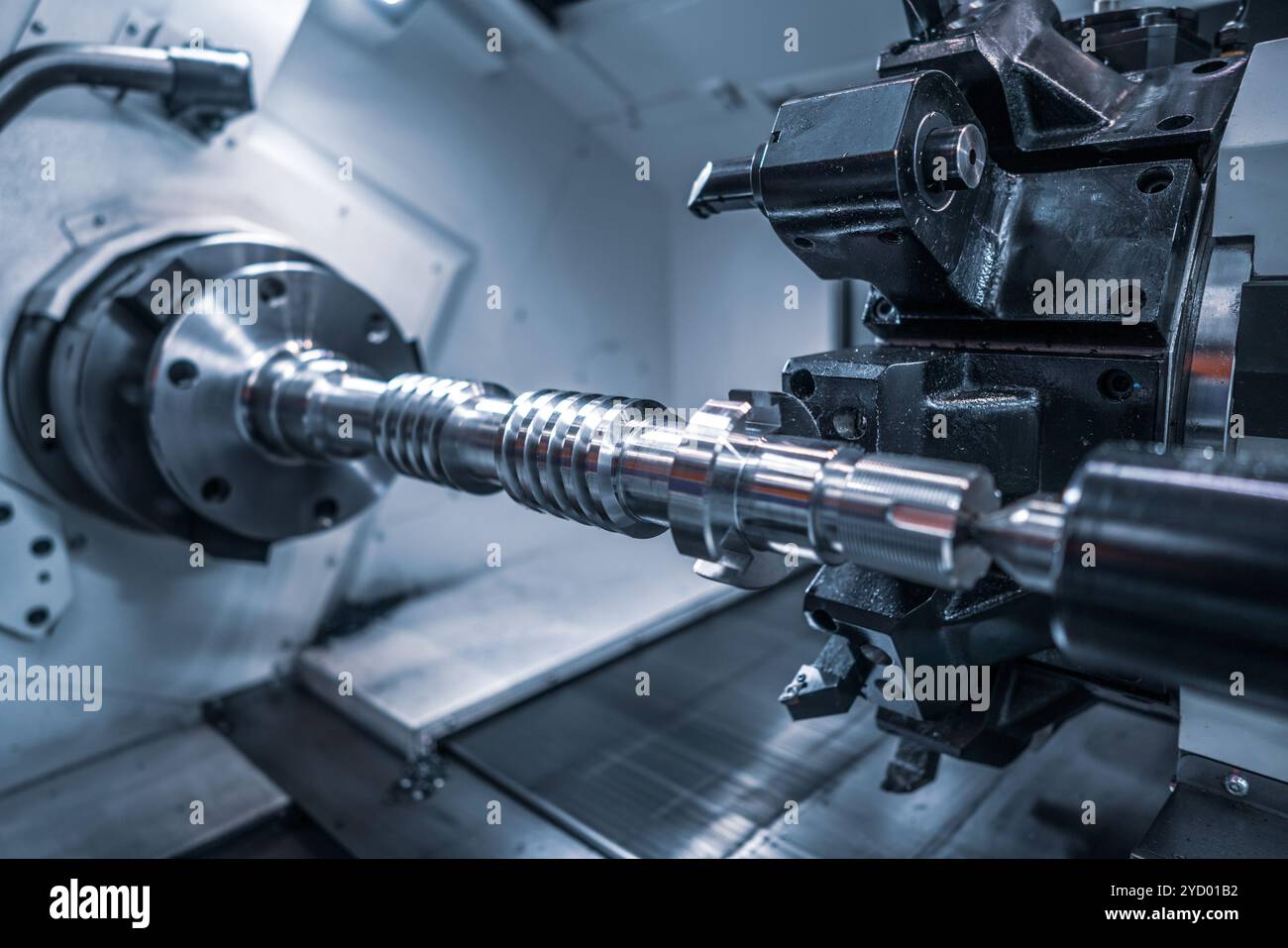 Metalworking CNC milling machine. Cutting metal modern processing technology. Stock Photo