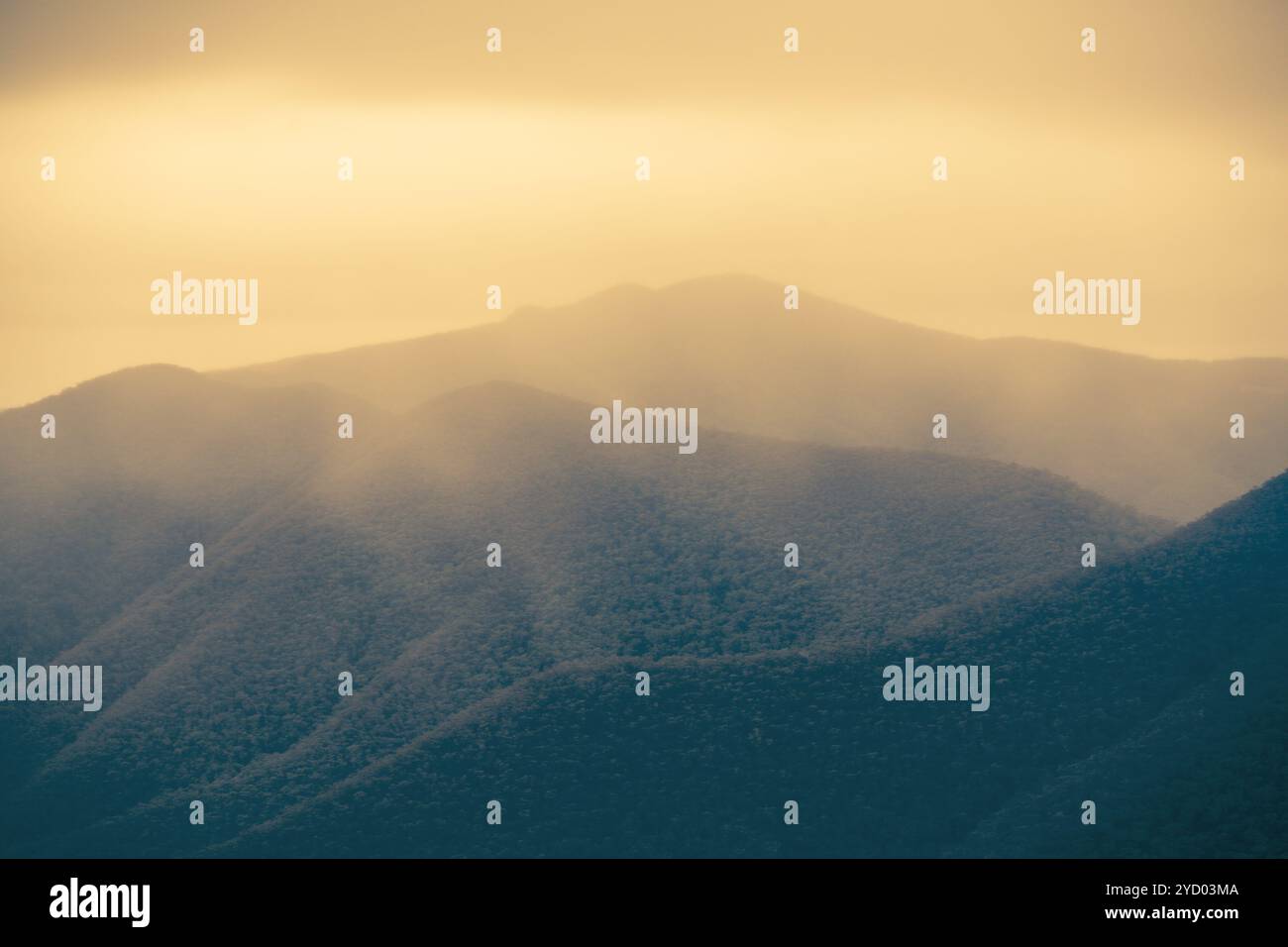 The Wonder of Misty Mountain Ranges Stock Photo - Alamy