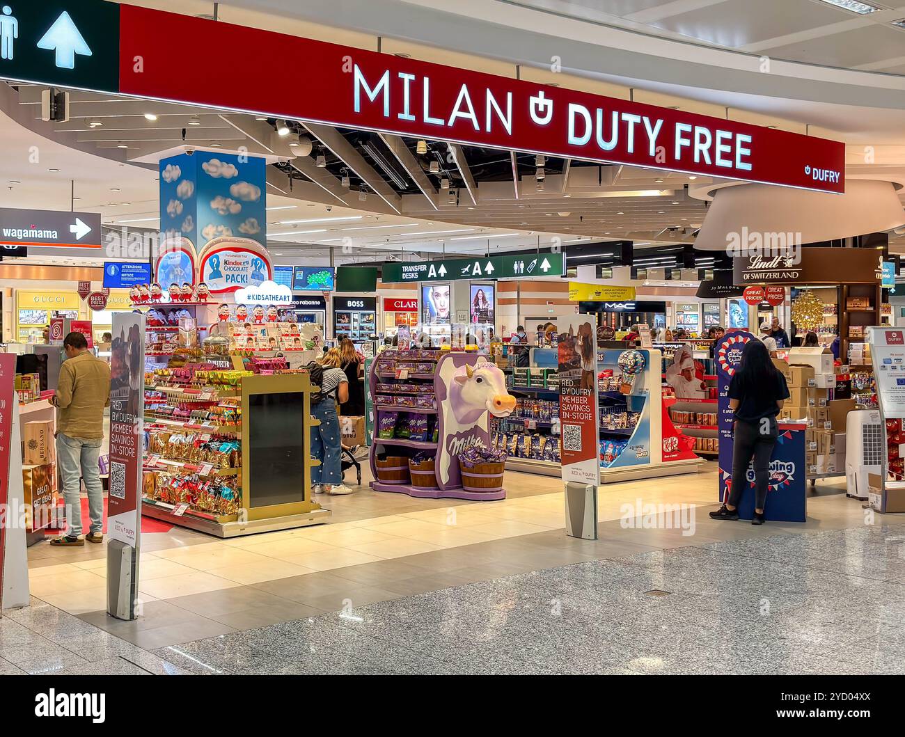 Ferno, Milan-Malpensa, Italy - September 29, 2024: Duty-free shopping area  inside Terminal 1 of Milan Malpensa International Airport Stock Photo