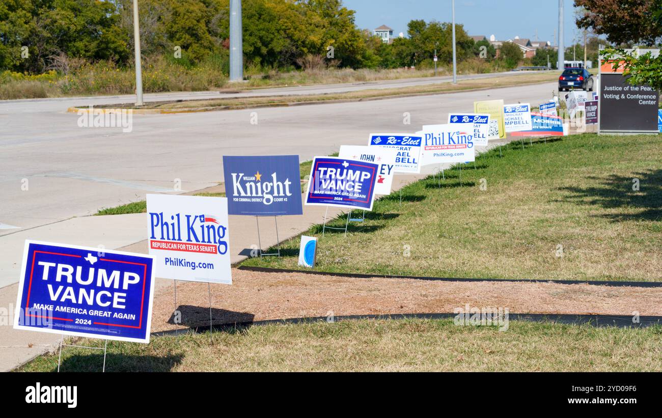 Political signs at early voting location in Fort Worth, Texas USA prior to the 2024 election. Stock Photo