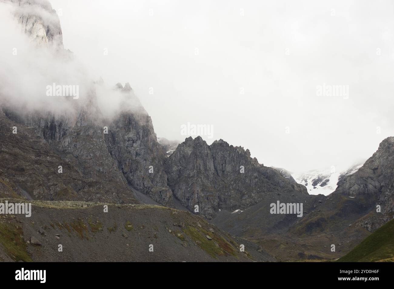 Sharp Sense Plus Steep rocky cliff partially shrouded hi-res stock photography and ...