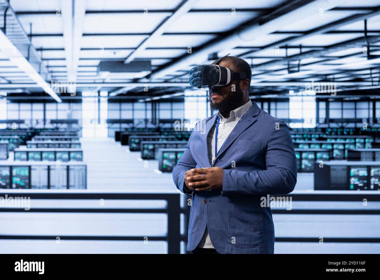 Admin working in data center, using VR headset to configure network infrastructure. IT specialist in server hub looking for technical issues using virtual reality technology Stock Photo