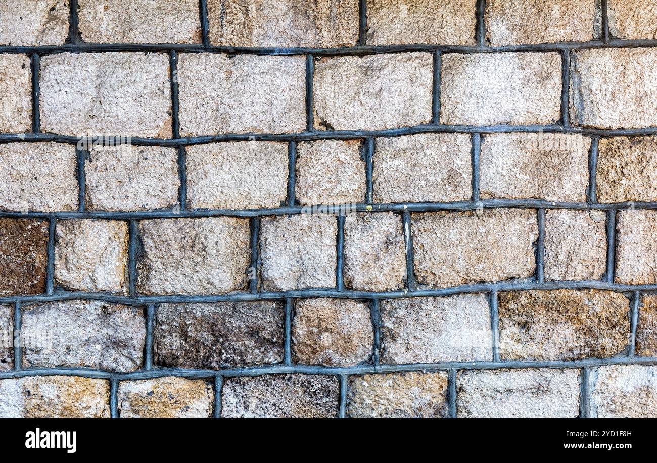 Weathered grey stone wall as background texture. Natural stones masonry ...