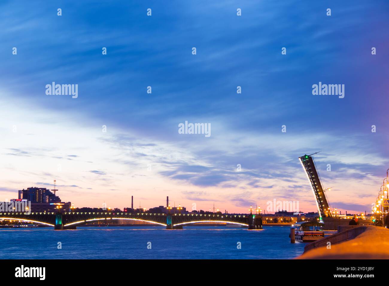 Dilution of bridges in St. Petersburg. Peter Romance. Sight of Peter. Neva River. Dawn in the city. White Nights. Russia St. Pet Stock Photo