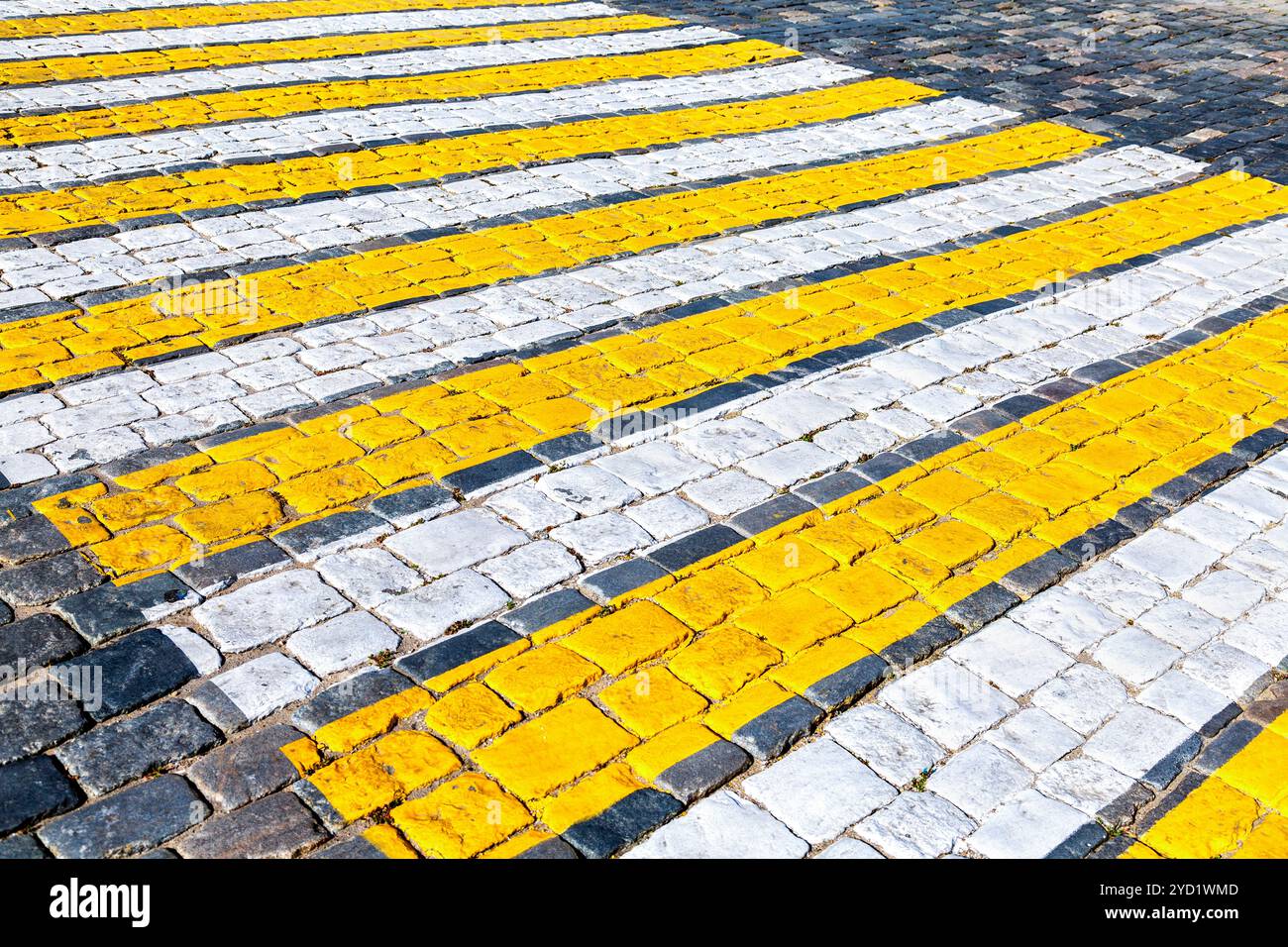 Pedestrian crossing with white and yellow stripes Stock Photo - Alamy