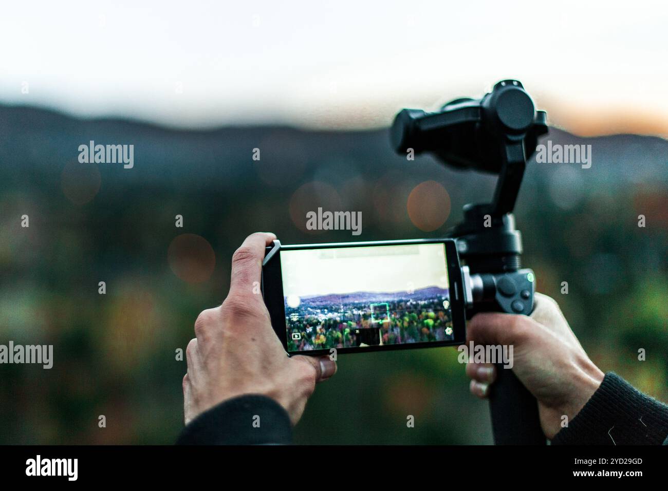 Filming with a gimbal and a mobile phone Stock Photo - Alamy