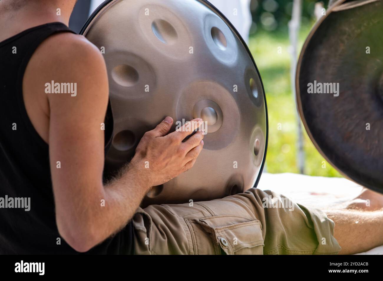 Man playing a traditional steel handpan Stock Photo