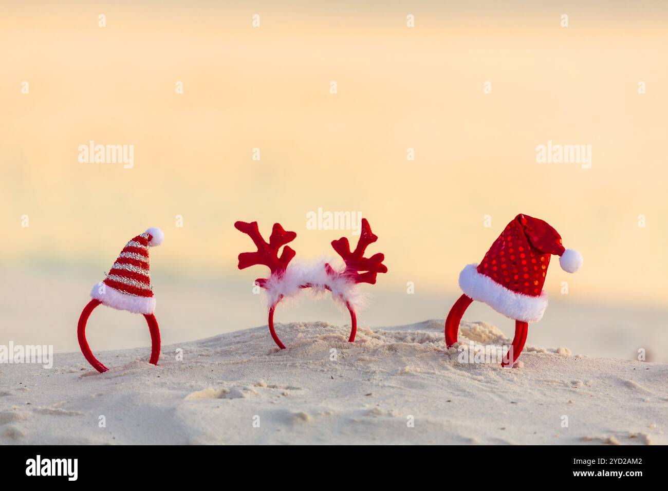 Christmas Santa Hat headbands on beach Stock Photo