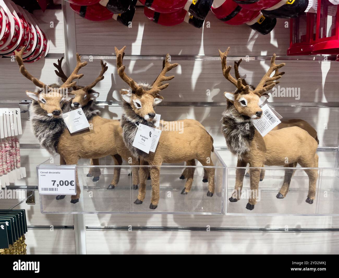 stuffed deer figures, store shelves, prices in euros. Catalonia, Spain - Smartphone Captured Stock Image