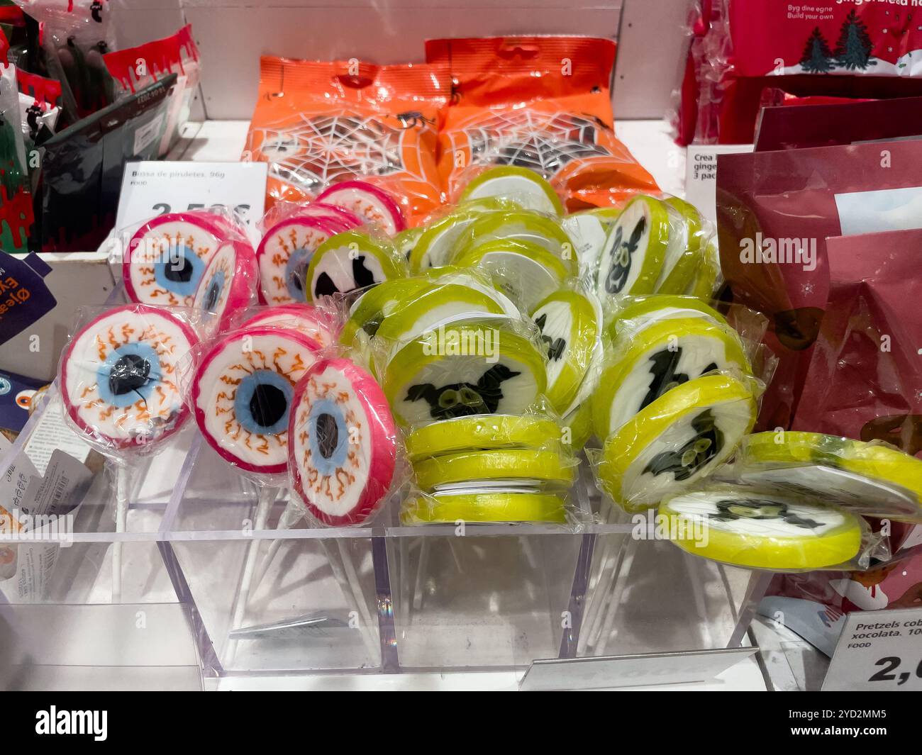 lollipops with bats and eyes for Halloween, store shelves, prices in euros. Catalonia, Spain - Smartphone Captured Stock Image