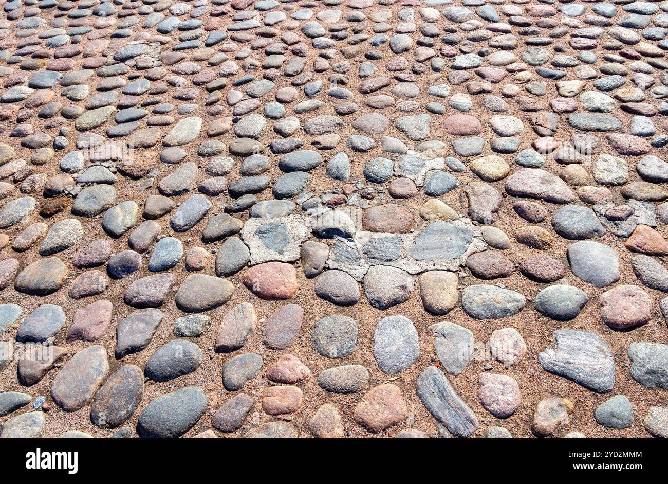 Old cobblestone pavement as background texture Stock Photo