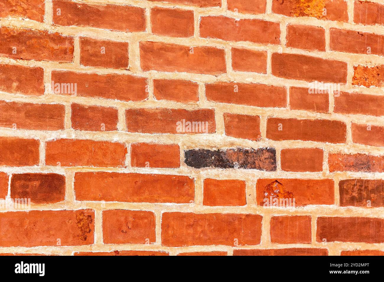 Red brick wall as creative background texture Stock Photo