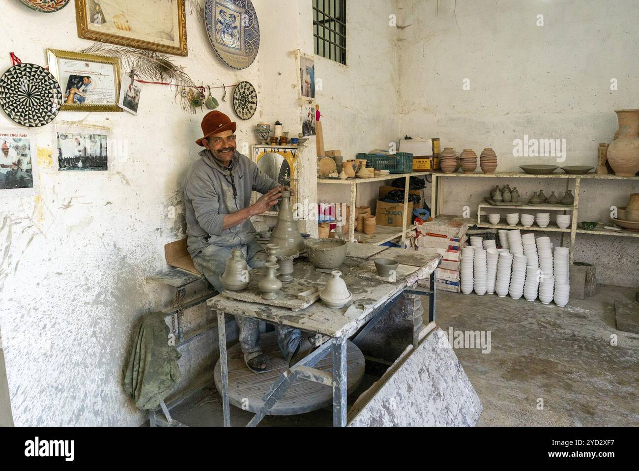 Fez, Morocco, 4 March, 2024: Moroccan potter at work in his pottery studio in downtown Fez northern inland Morocco, Africa Stock Photo