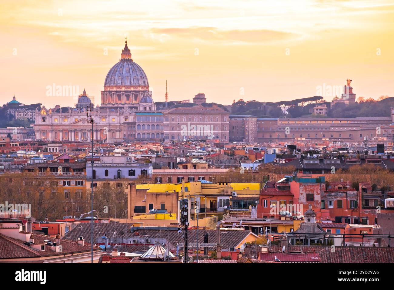 Eternal city of Rome rooftops and Vatican Basilica of Saint Peter golden sunset view Stock Photo