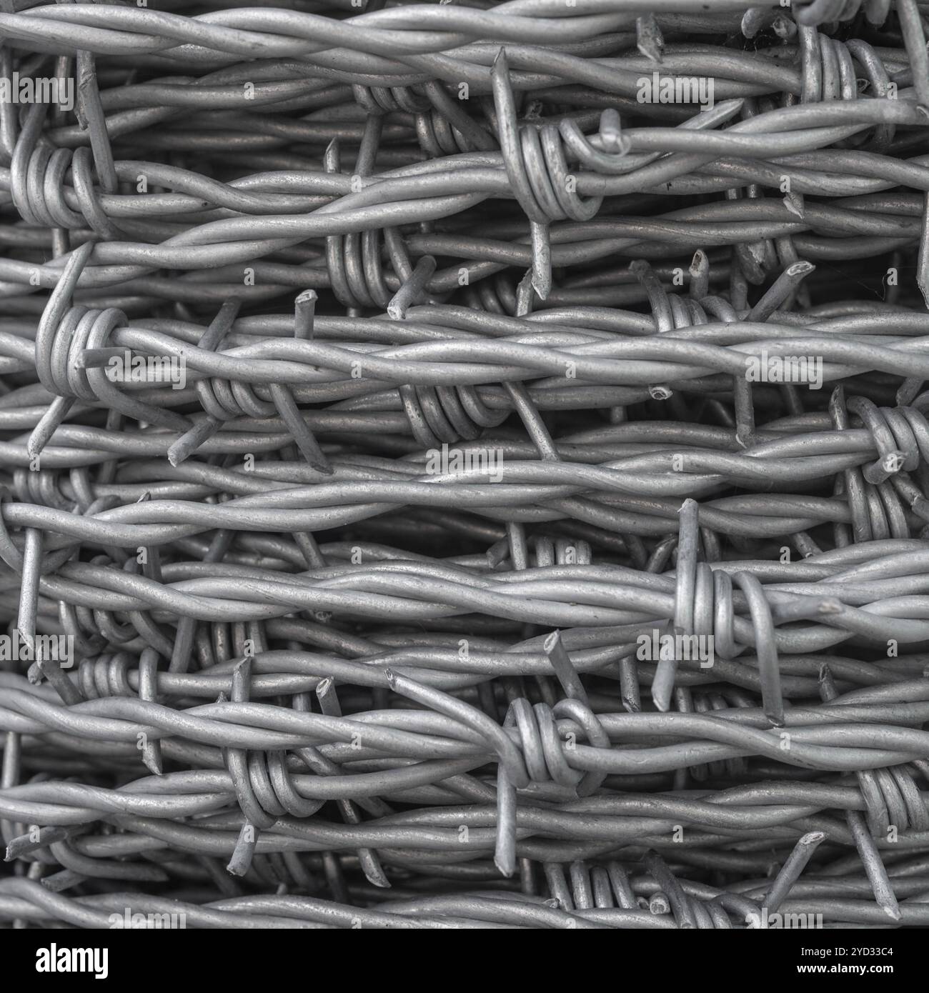 Abstract Background Texture Of Coiled Barbed Wire Stock Photo