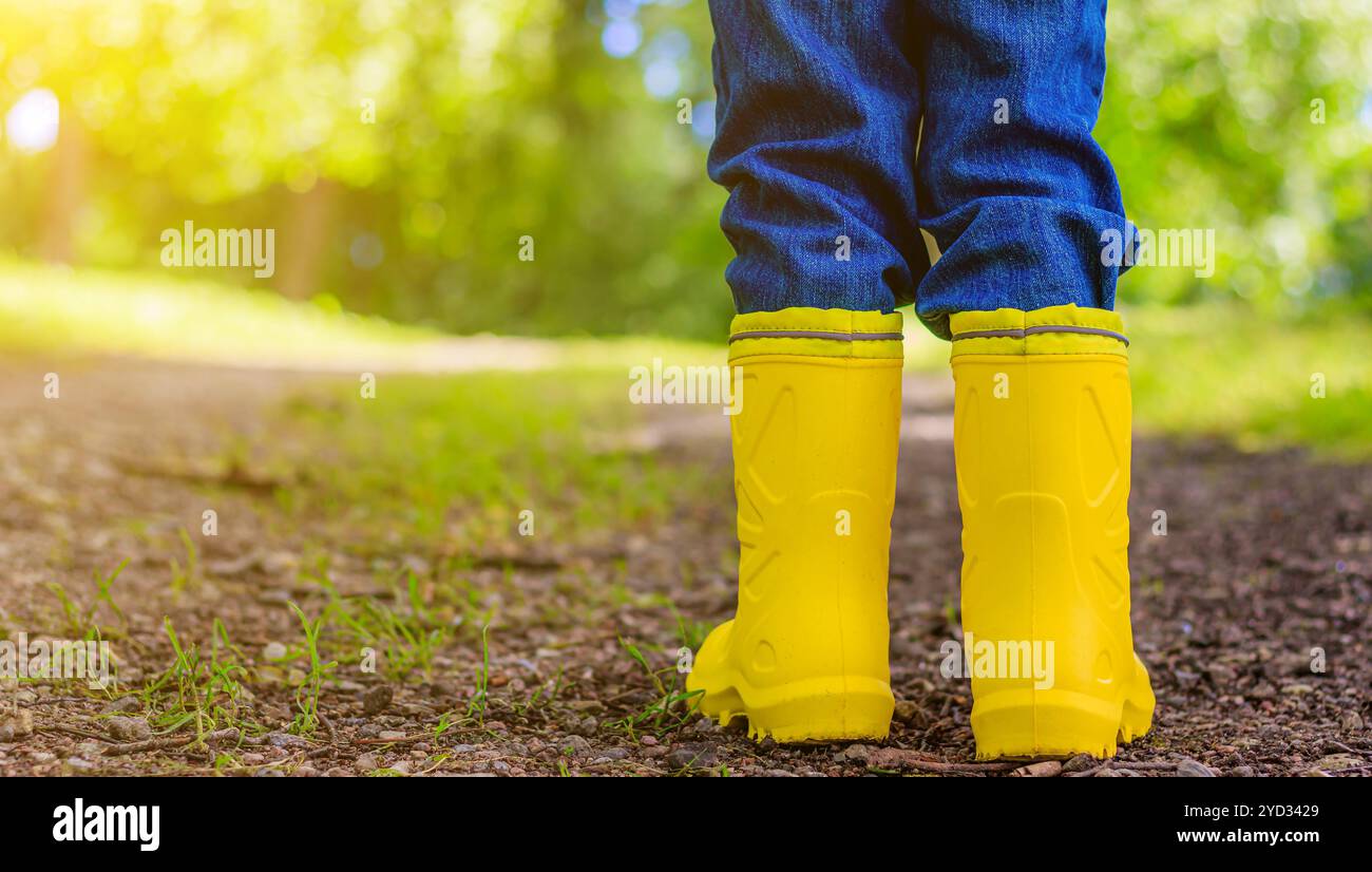 yellow-rubber-boots-on-the-child-s-feet-shoes-for-wet-weather